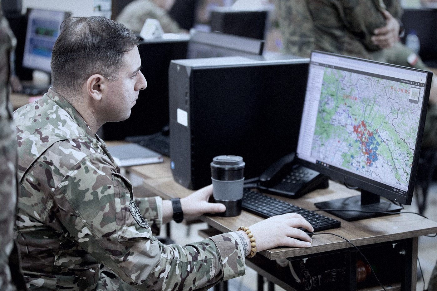 Command post with an operator monitoring the situation on screen